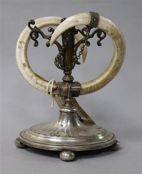 A plated tusk candlestick